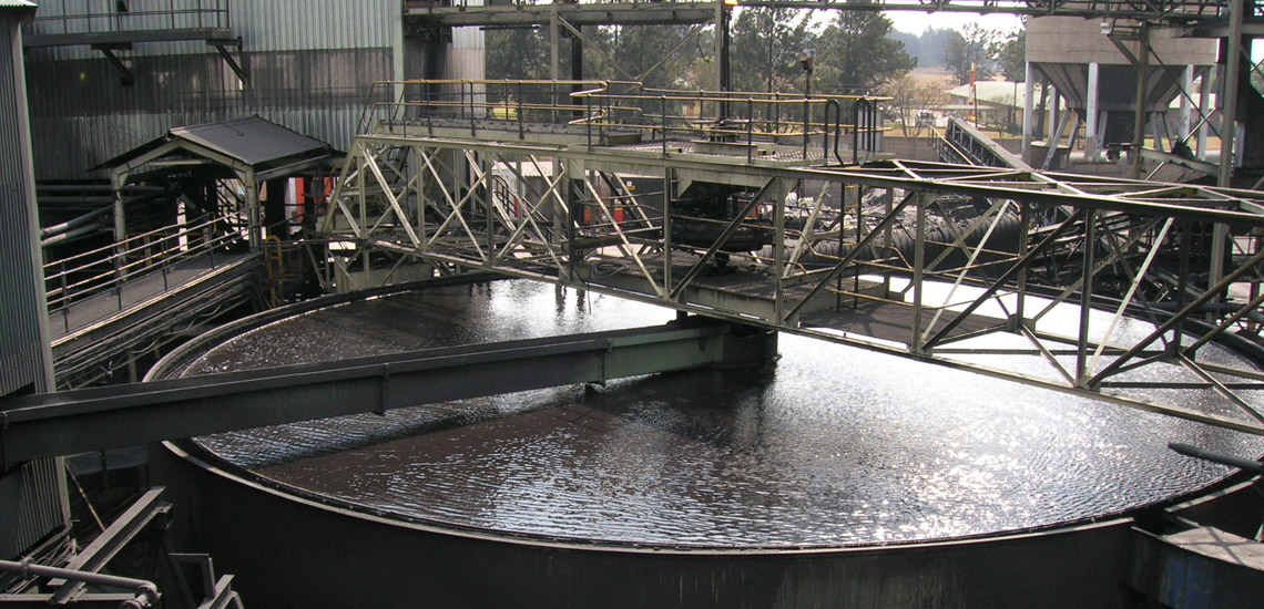 Coal tailings conventional thickener showing feed launder and bridge in South Africa